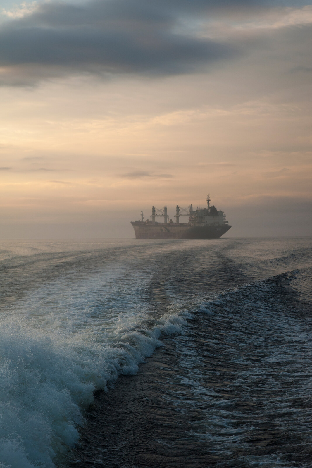 Cargo ship at dawn