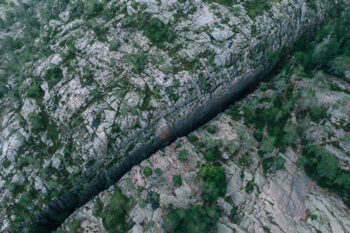 An aerial view of the passage between two mountain walls in what is called 'Slåttdalsskrevan' in the High Coast.